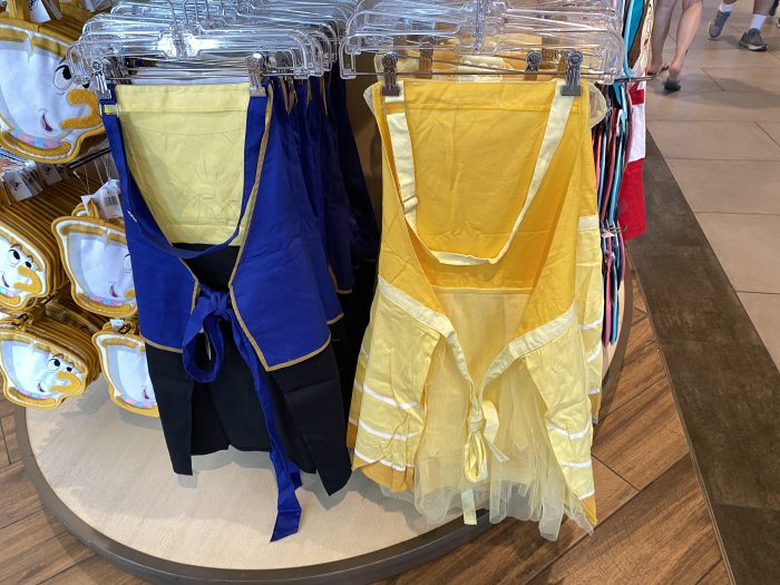 https://touringplans.com/blog/wp-content/uploads/2020/06/Beauty-and-the-Beast-Themed-Aprons-Back-700x525.jpg