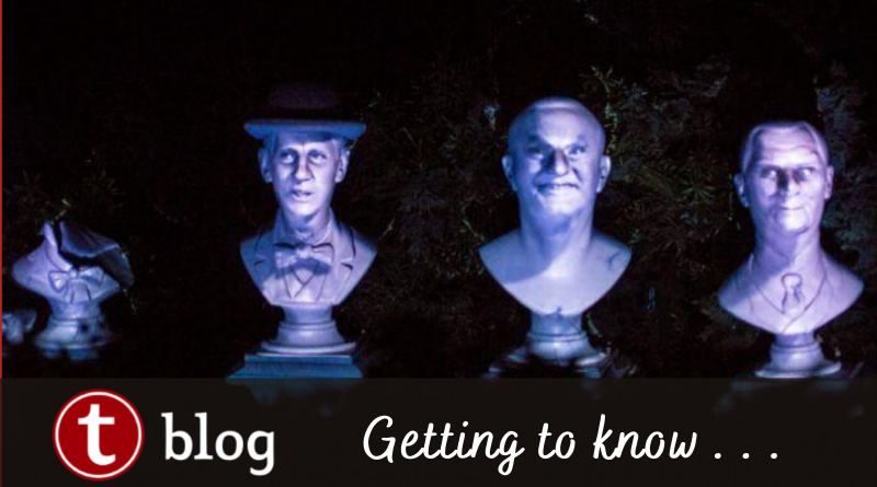 5 things about haunted mansion cover image showing busts with eerie lightning from the ride