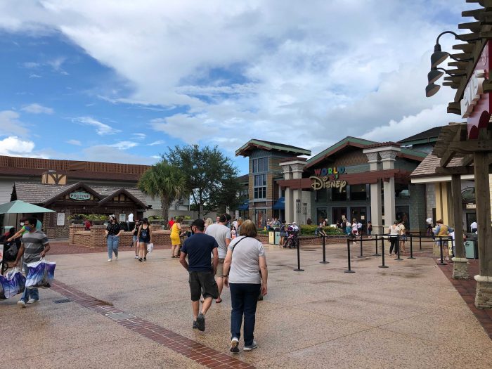 https://touringplans.com/blog/wp-content/uploads/2020/10/Extended-Queue-for-World-of-Disney-Store-at-Disney-Springs-700x525.jpg