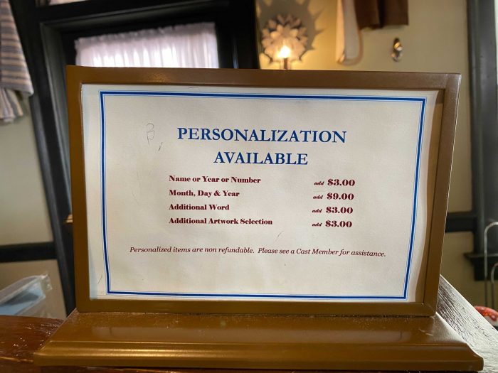 https://touringplans.com/blog/wp-content/uploads/2020/10/Personalized-Ornament-Pricing-at-Magic-Kingdom-700x525.jpg