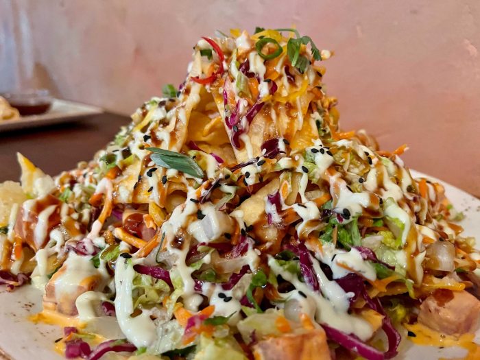 https://touringplans.com/blog/wp-content/uploads/2021/04/Ahi-Nachos-Yak-and-Yeti-700x525.jpg