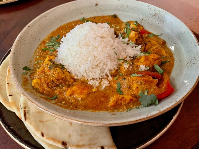 https://touringplans.com/blog/wp-content/uploads/2021/04/Chicken-Tikka-Masala-Yak-and-Yeti-700x525.jpg