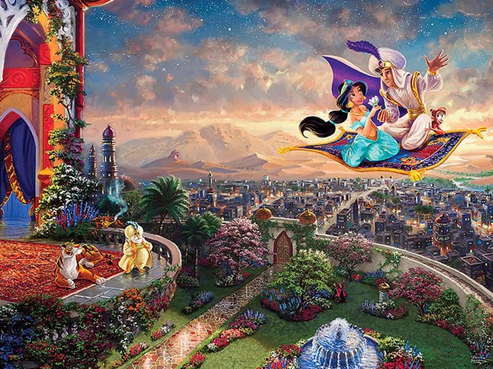 Jigsaw puzzle with image of Aladdin and Jasmine flying against a sunset sky with rural landscape in the background