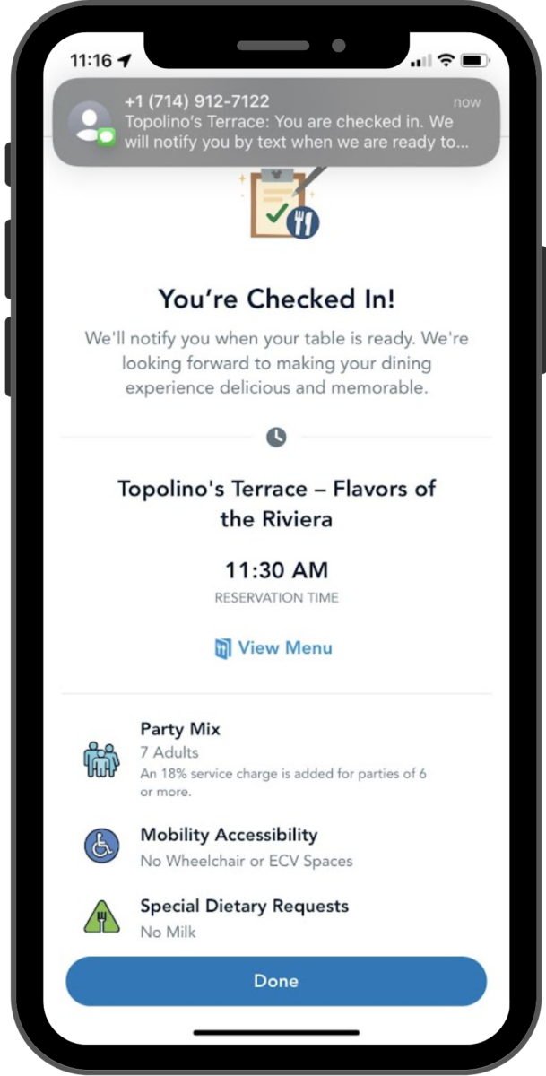 The confirmation screen indicates that you're checked in, and a notification for a text message from the restaurant confirming check-in is visible at the top