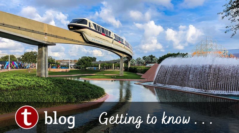 Disney World attraction types cover article showing the monorail passing over EPCOT with the upwards-jumping fountain on the right side
