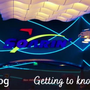 Getting to Know Soarin' cover image showing the Soarin' queue with the logo above