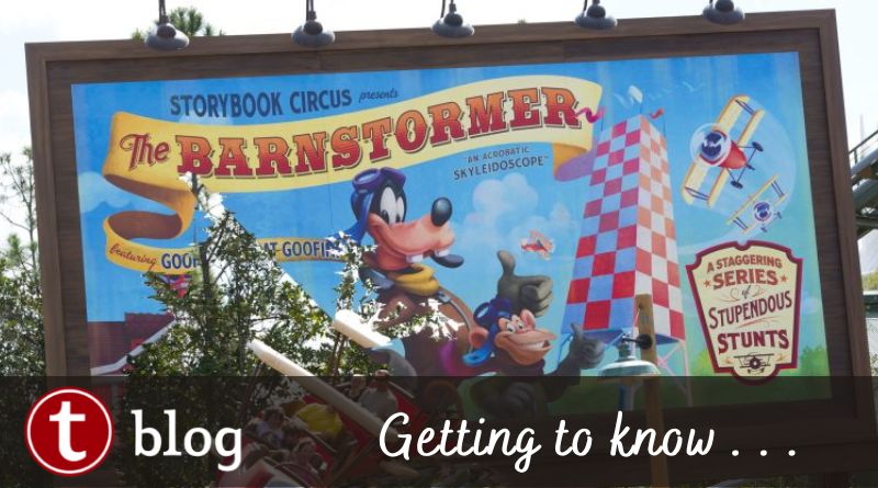 Barnstormer Getting To Know article cover showing a billboard with Goofy riding on the coaster